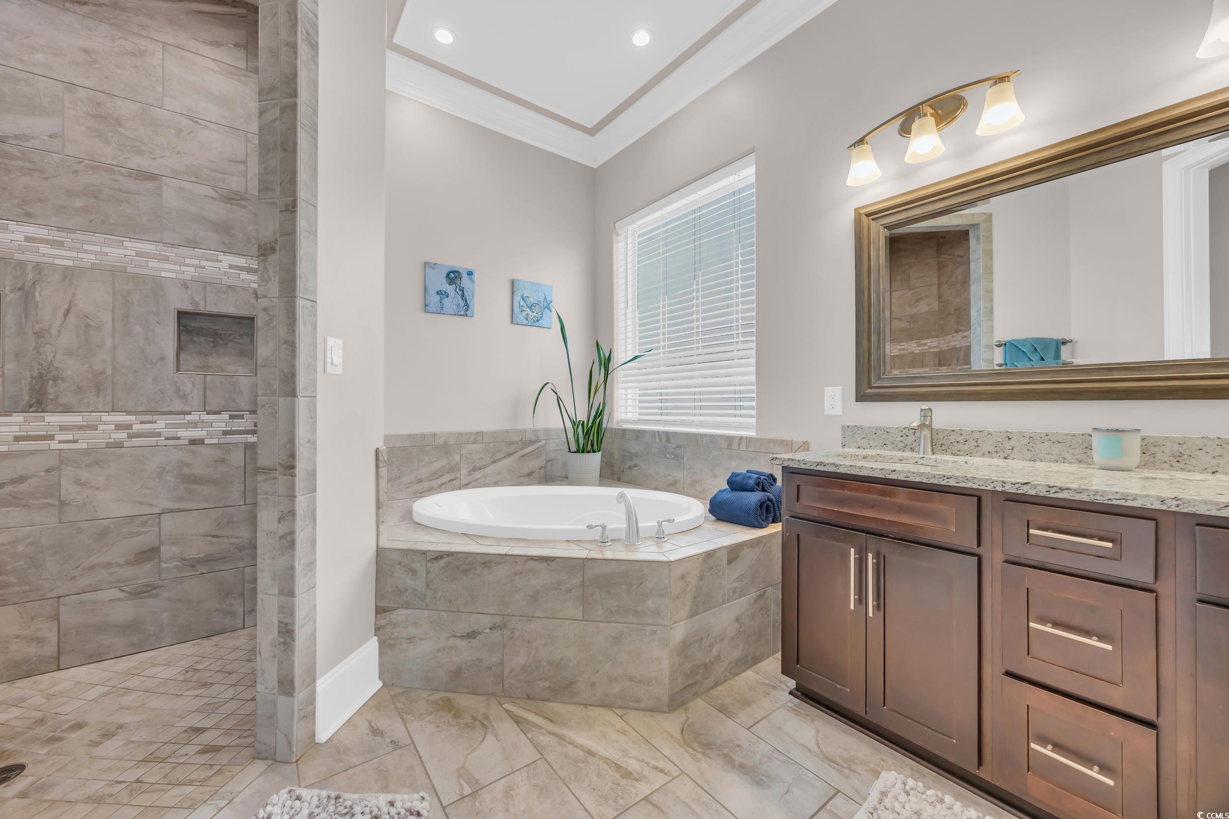 937 Bluffview Drive Myrtle Beach, SC 29579 - Photo 4 of 40 Full bathroom with a garden tub, ornamental molding, vanity, walk in shower, and recessed lighting