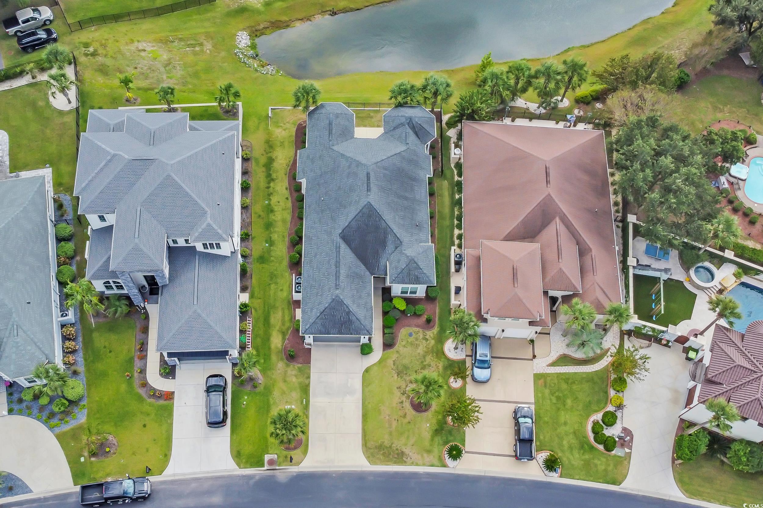 937 Bluffview Drive Myrtle Beach, SC 29579 - Photo 6 of 40 Aerial view of residential area with a large body of water