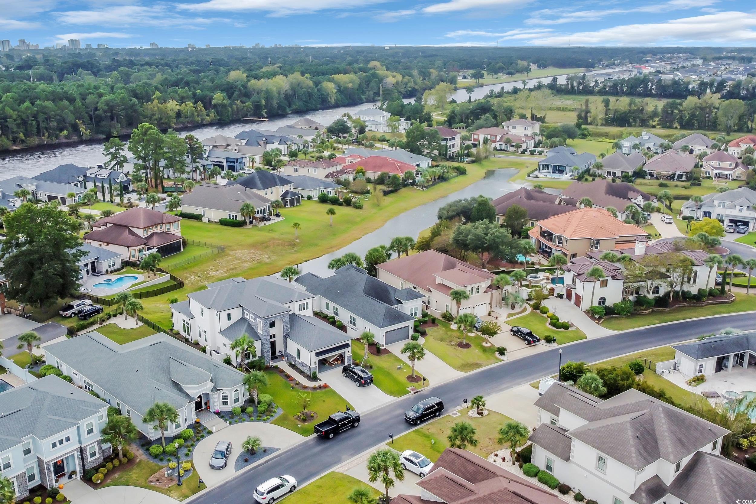 937 Bluffview Drive Myrtle Beach, SC 29579 - Photo 10 of 40 Aerial view of residential area with a large body of water