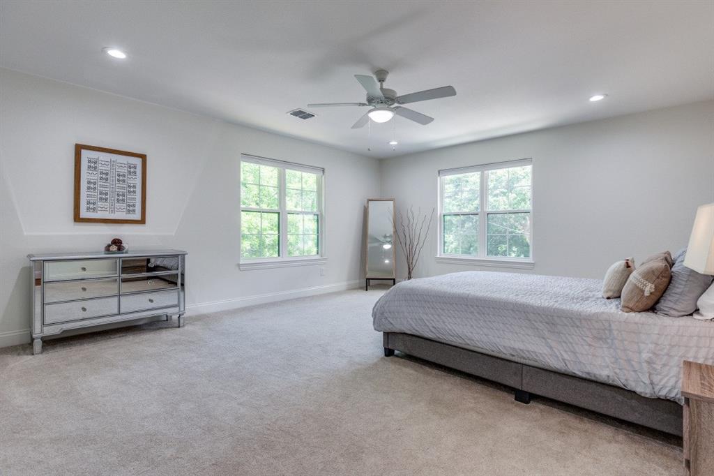 1000 Cameron Avenue Dallas, TX 75223 - Photo 24 of 38 a bedroom with a bed and a large window