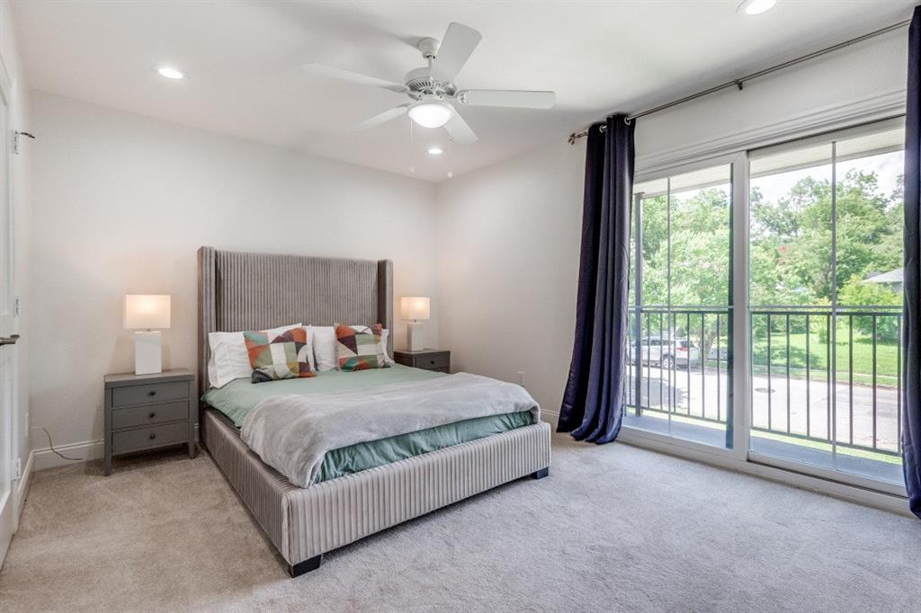 1000 Cameron Avenue Dallas, TX 75223 - Photo 26 of 38 a bedroom with a large bed and a large window