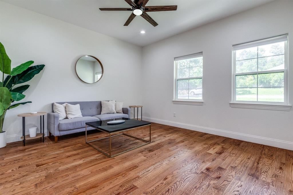 1000 Cameron Avenue Dallas, TX 75223 - Photo 10 of 38 a living room with furniture window and wooden floor