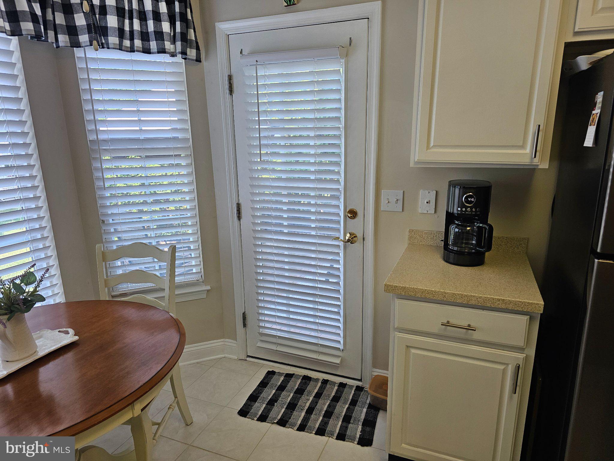 25 Chickadee Way Hamilton, NJ 08690 - Photo 13 of 26 a kitchen with a sink and a refrigerator