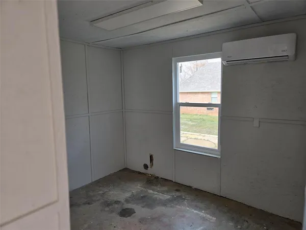 a view of a window in an empty room