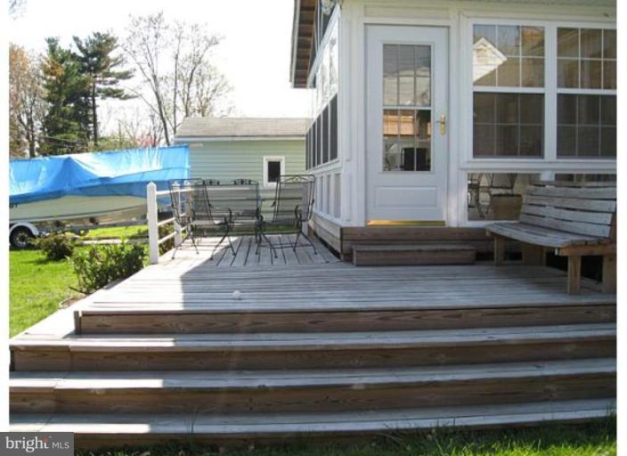 9117 Smith Avenue Nottingham, MD 21236 - Photo 2 of 17 a view of a house with a patio