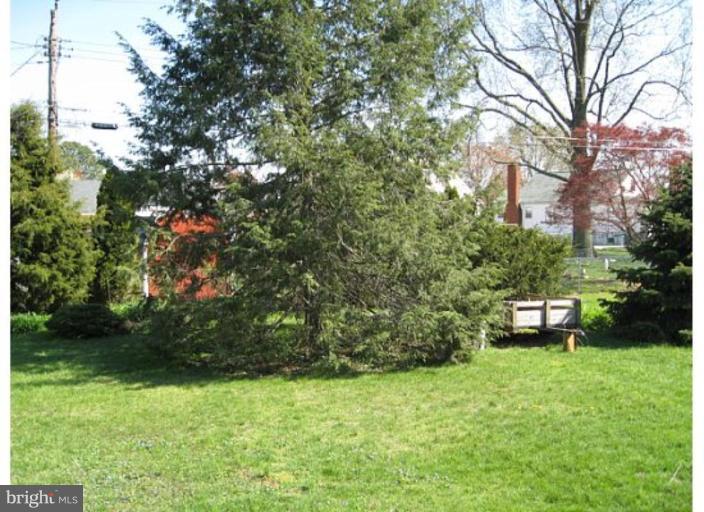 9117 Smith Avenue Nottingham, MD 21236 - Photo 13 of 17 a backyard of a house with lots of green space