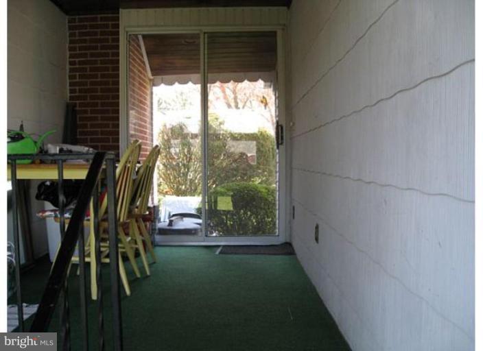 9117 Smith Avenue Nottingham, MD 21236 - Photo 7 of 17 a view of a porch