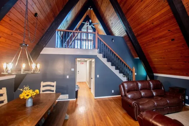 a kitchen with stainless steel appliances granite countertop a stove and a microwave