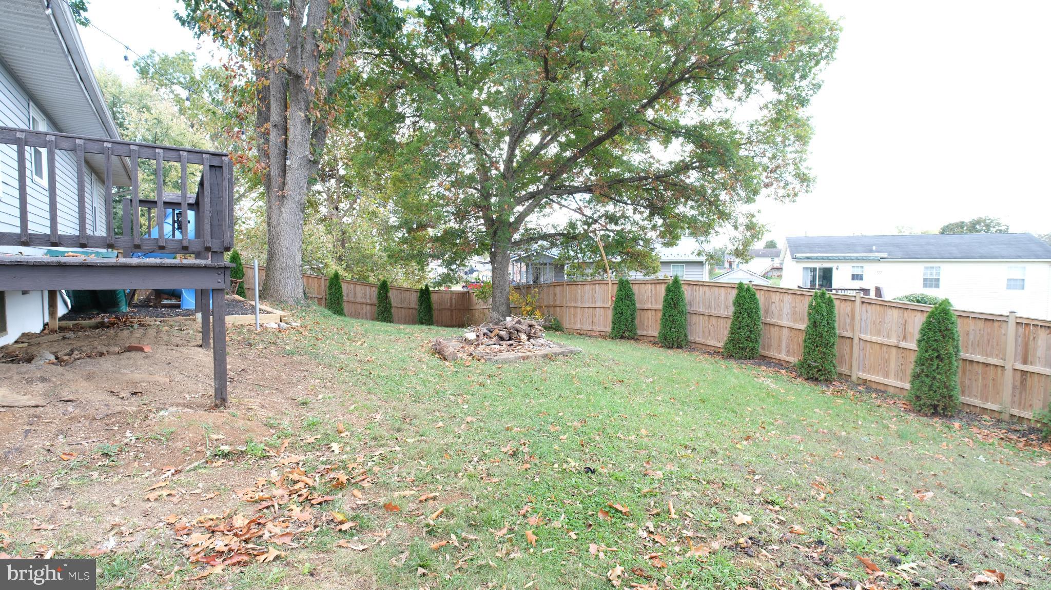 124 East Park Avenue Ranson, WV 25438 - Photo 3 of 23 a view of a house with backyard and a tree