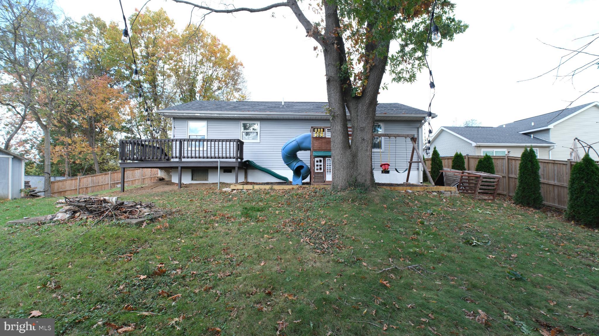 124 East Park Avenue Ranson, WV 25438 - Photo 5 of 23 a front view of a house with garden