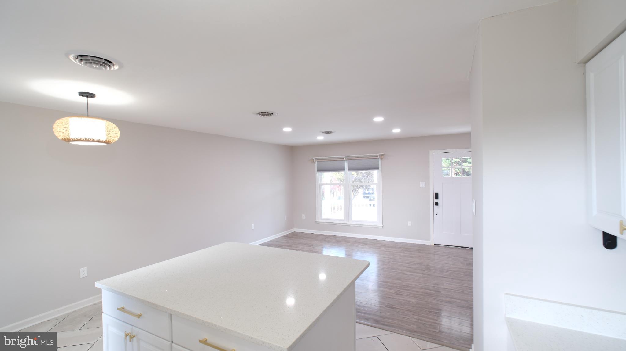 124 East Park Avenue Ranson, WV 25438 - Photo 9 of 23 a view of an empty room with a window
