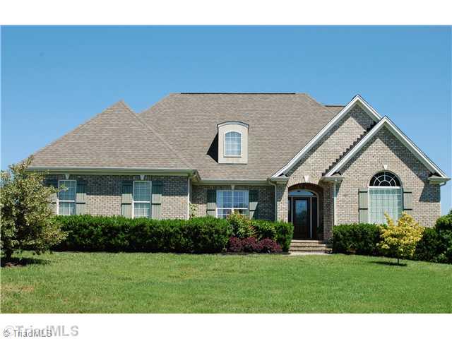 5624 Cape Fox Drive Oak Ridge, NC 27310 - Photo 1 of 16 Exterior Front. Perfectly situated on 1.1 acres.