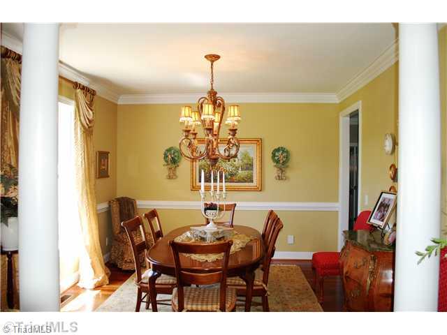 5624 Cape Fox Drive Oak Ridge, NC 27310 - Photo 3 of 16 Dining Room. Beautiful moldings, decorative columns & tasteful lighting fixtures can be found throughout.