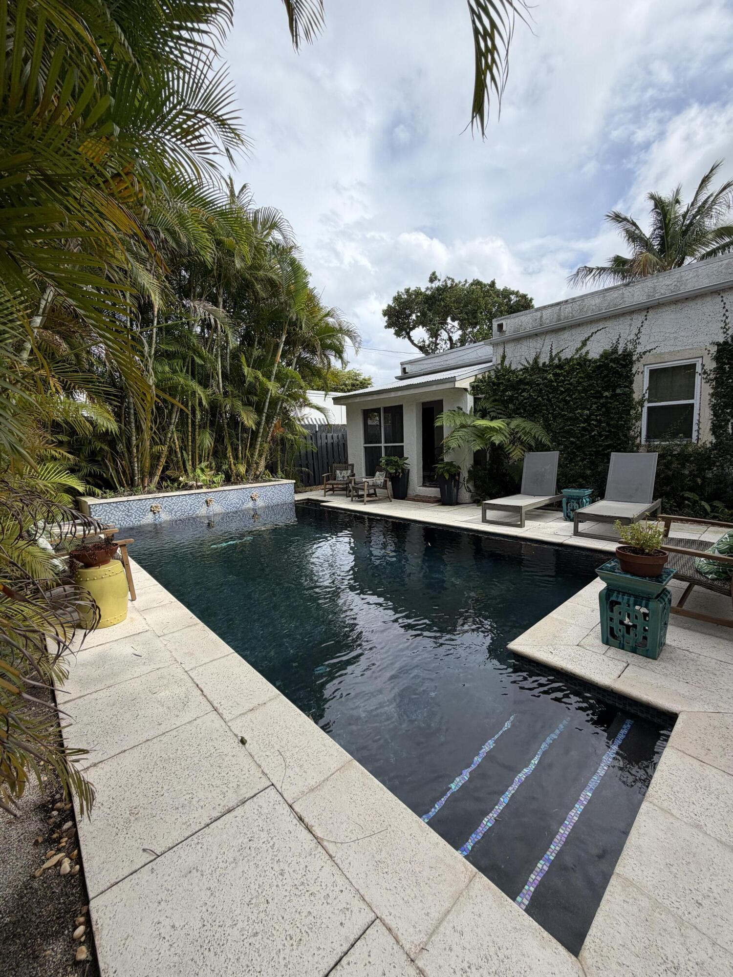 515 Ardmore Road West Palm Beach, FL 33401 - Photo 36 of 36 a view of swimming pool with outdoor seating and plants