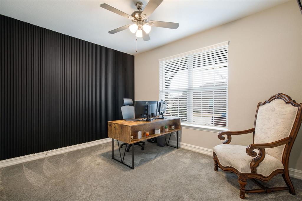 4113 Crossroads Court Oak Point, TX 75068 - Photo 20 of 33 a living room with furniture and a window
