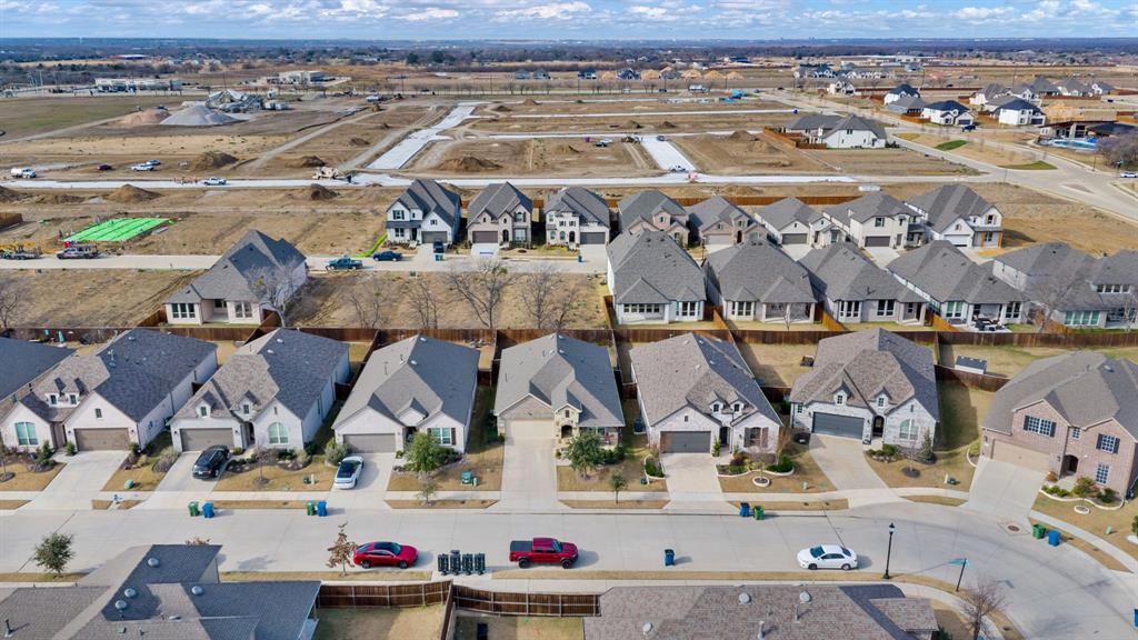 4113 Crossroads Court Oak Point, TX 75068 - Photo 30 of 33 an aerial view of residential houses with outdoor space