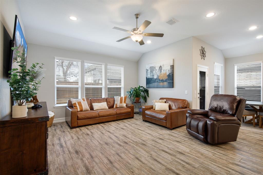 4113 Crossroads Court Oak Point, TX 75068 - Photo 5 of 33 a living room with furniture and a large window