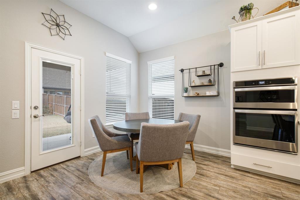 4113 Crossroads Court Oak Point, TX 75068 - Photo 10 of 33 a dining room with furniture and window