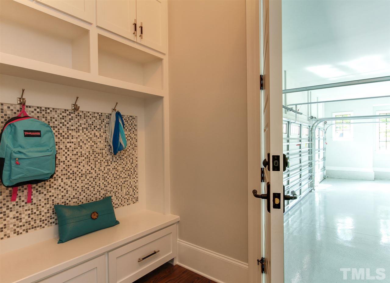 7910 Hardwick Drive Raleigh, NC 27615 - Photo 16 of 25 a bathroom with a tub and shower