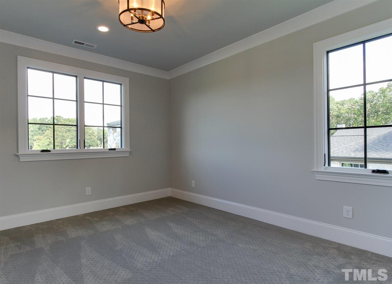 7910 Hardwick Drive Raleigh, NC 27615 - Photo 22 of 25 an empty room with a window