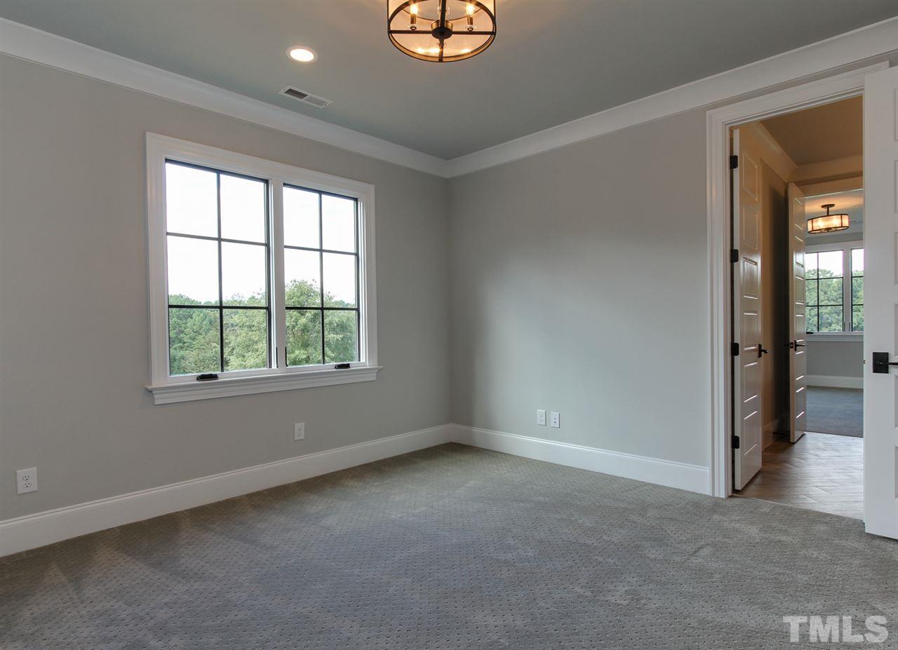 7910 Hardwick Drive Raleigh, NC 27615 - Photo 23 of 25 an empty room with a window