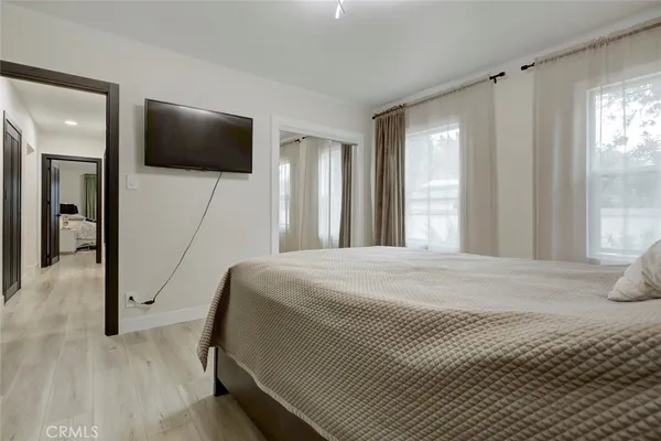 a bathroom with a shower and a mirror