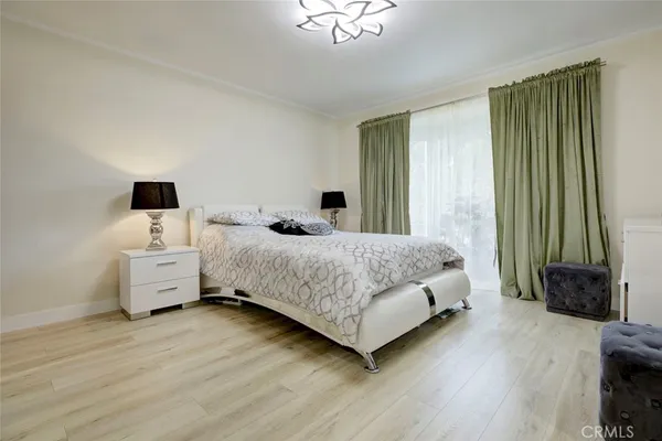 a front view of a house with basket ball court