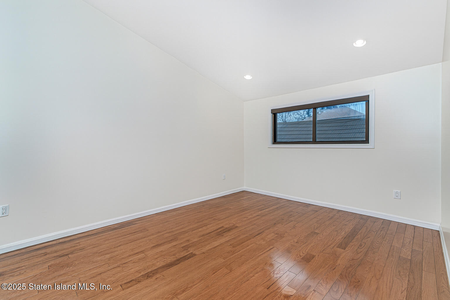 175 Winding Woods Loop, Unit 69 Staten Island, NY 10307 - Photo 17 of 29 wooden floor in a room