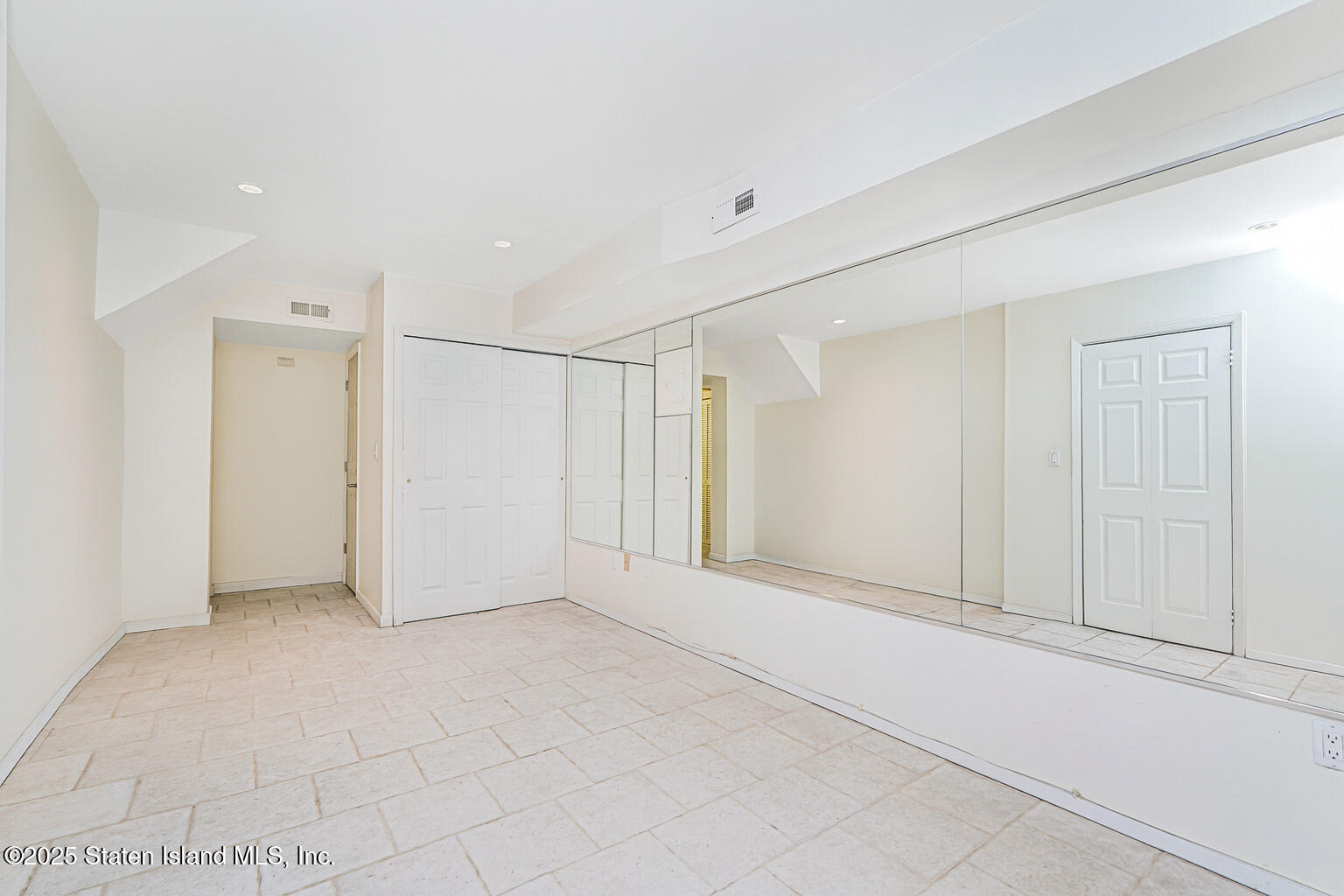 175 Winding Woods Loop, Unit 69 Staten Island, NY 10307 - Photo 3 of 29 a view of an empty room