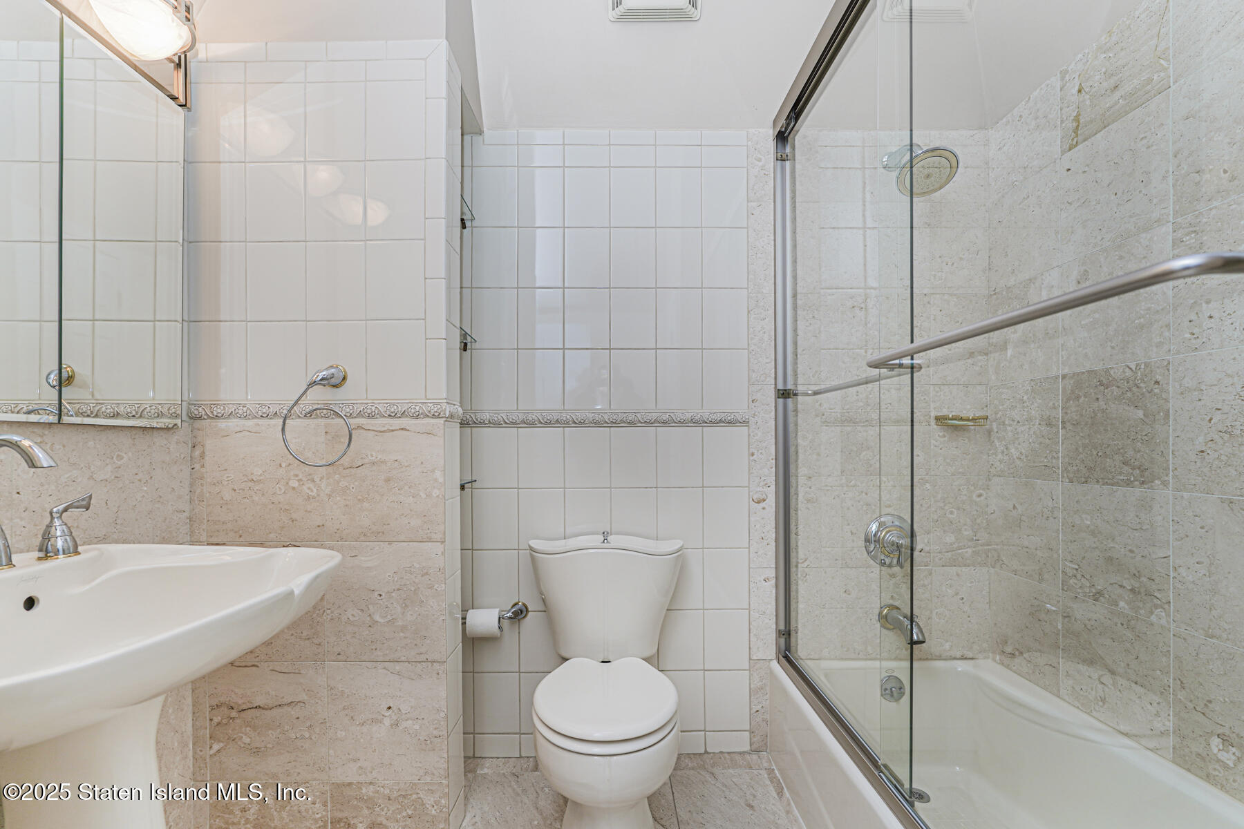 175 Winding Woods Loop, Unit 69 Staten Island, NY 10307 - Photo 5 of 29 a bathroom with a sink toilet and shower