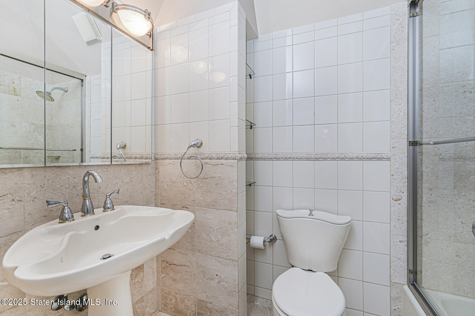 175 Winding Woods Loop, Unit 69 Staten Island, NY 10307 - Photo 6 of 29 a bathroom with a sink toilet and shower