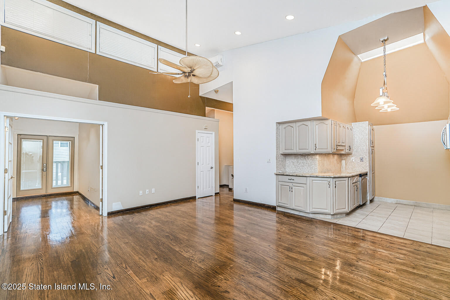 175 Winding Woods Loop, Unit 69 Staten Island, NY 10307 - Photo 8 of 29 a view of a kitchen with a sink and a refrigerator
