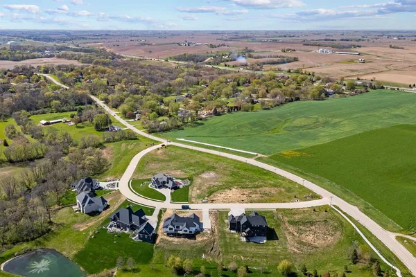 a view of a city with lawn chairs