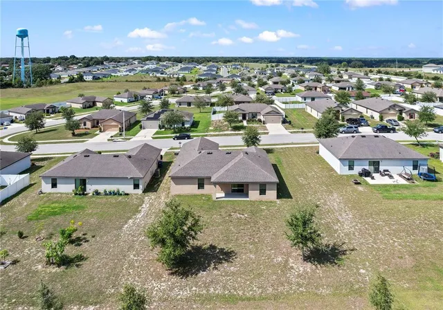 a house that has yard in front of it