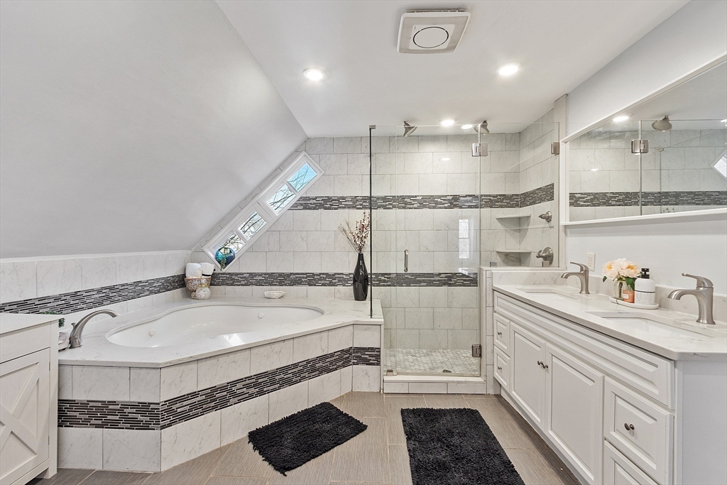 459 High Street Clinton, MA 01510 - Photo 22 of 35 a bathroom with a sink a toilet and a shower