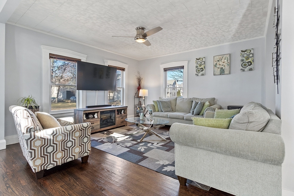 459 High Street Clinton, MA 01510 - Photo 3 of 35 a living room with furniture fireplace and a flat screen tv