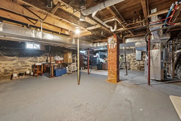 a view of a garage with cars