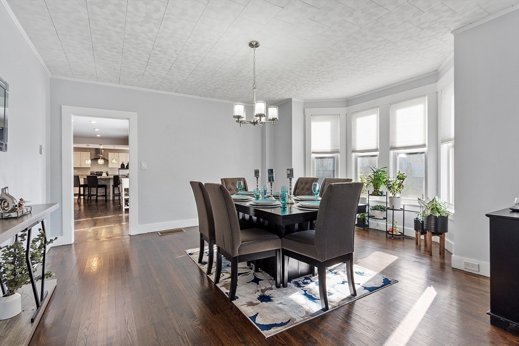459 High Street Clinton, MA 01510 - Photo 5 of 35 a view of a dining room with furniture window and wooden floor