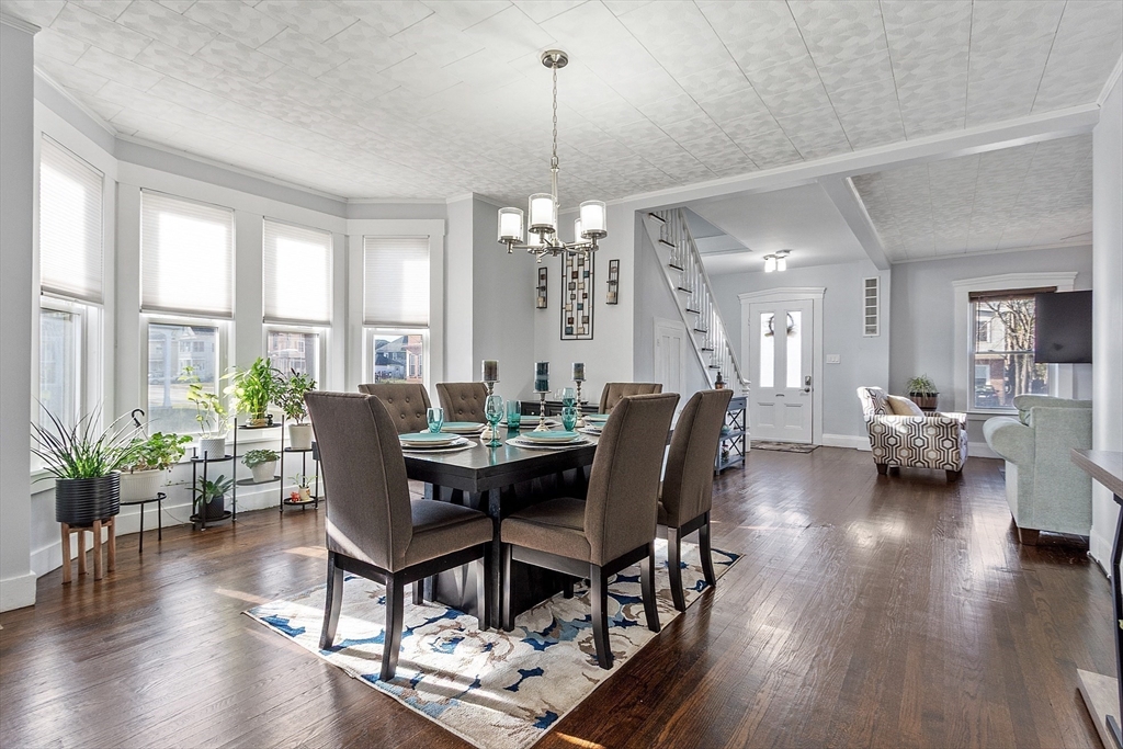 459 High Street Clinton, MA 01510 - Photo 6 of 35 a view of a dining room with furniture window and wooden floor