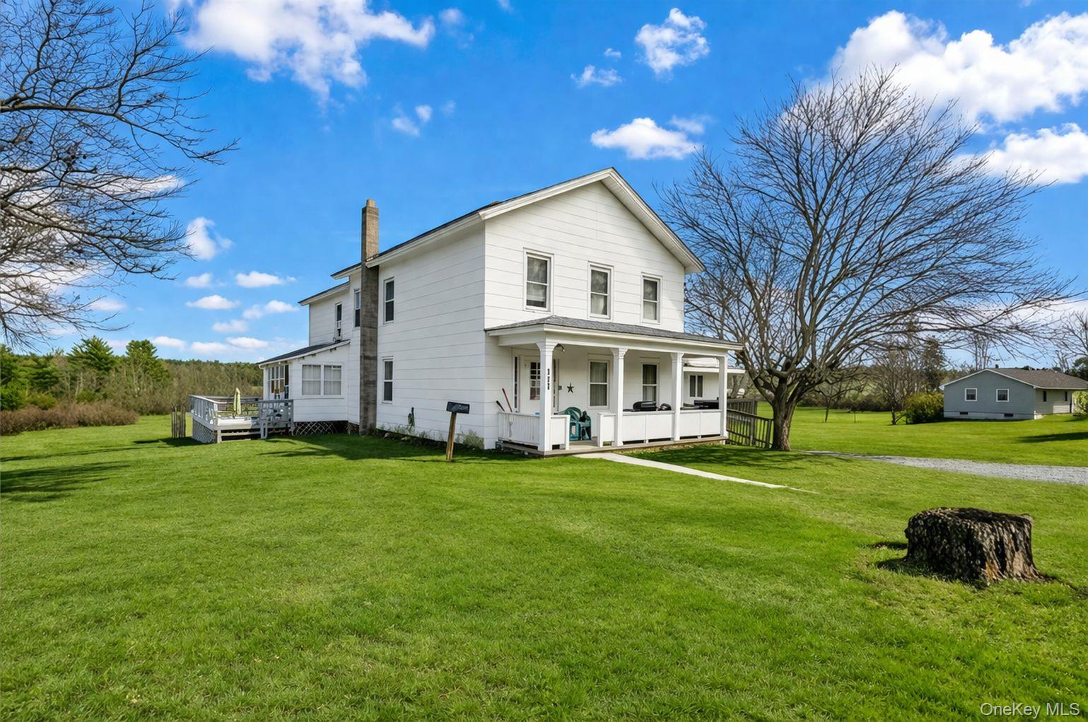 185 Rock Ridge Avenue Monticello, NY 12701 - Photo 2 of 6 a view of a house with a yard