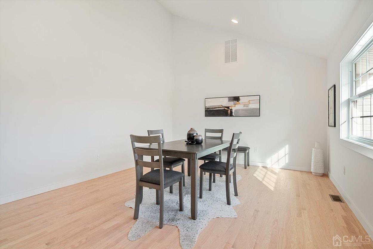 47 Eardley Road Edison, NJ 08817 - Photo 14 of 29 a view of a dining room with furniture and wooden floor