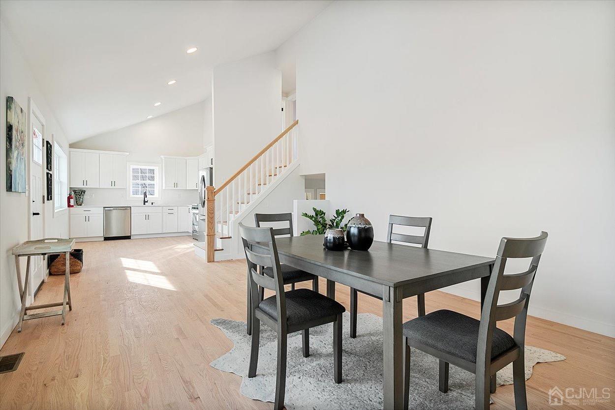 47 Eardley Road Edison, NJ 08817 - Photo 16 of 29 a view of a dining room with furniture and wooden floor