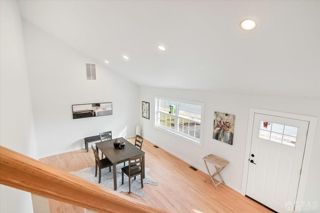 47 Eardley Road Edison, NJ 08817 - Photo 18 of 29 a dining room with furniture and wooden floor