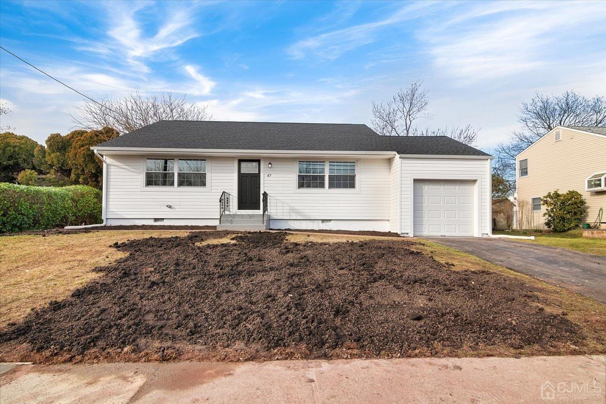 47 Eardley Road Edison, NJ 08817 - Photo 2 of 29 a view of a house with a yard