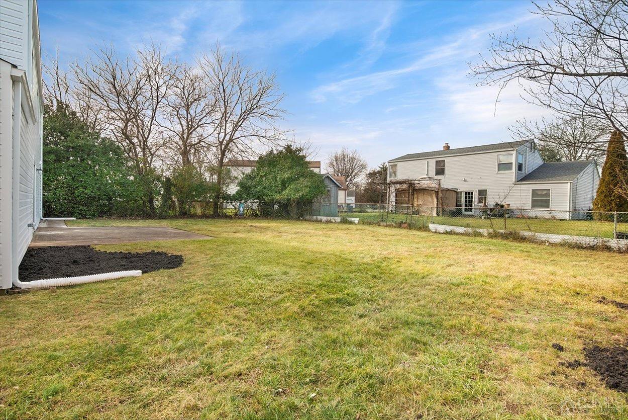 47 Eardley Road Edison, NJ 08817 - Photo 24 of 29 a view of a swimming pool with outdoor seating and yard
