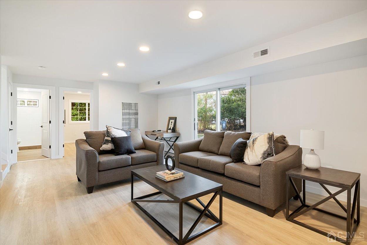 47 Eardley Road Edison, NJ 08817 - Photo 3 of 29 a living room with furniture and a large window