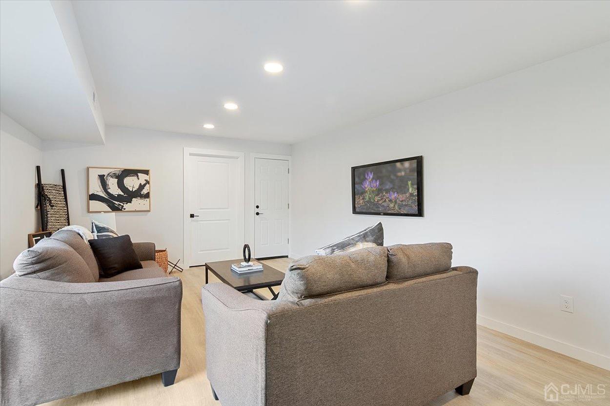 47 Eardley Road Edison, NJ 08817 - Photo 6 of 29 a living room with furniture and a couch