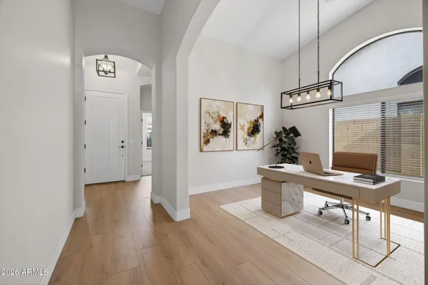 a view of an empty room with a closet