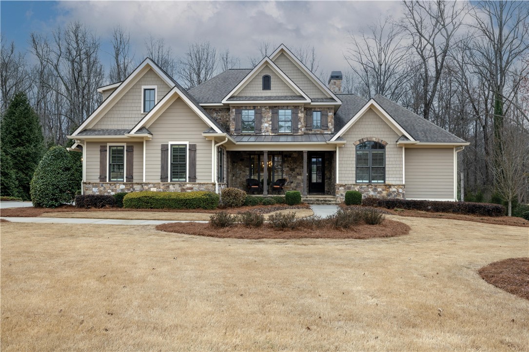 301 Stonebridge Drive Clemson, SC 29631 - Photo 1 of 47 This residence showcases a blend of natural stone and siding, complemented by an inviting covered porch.