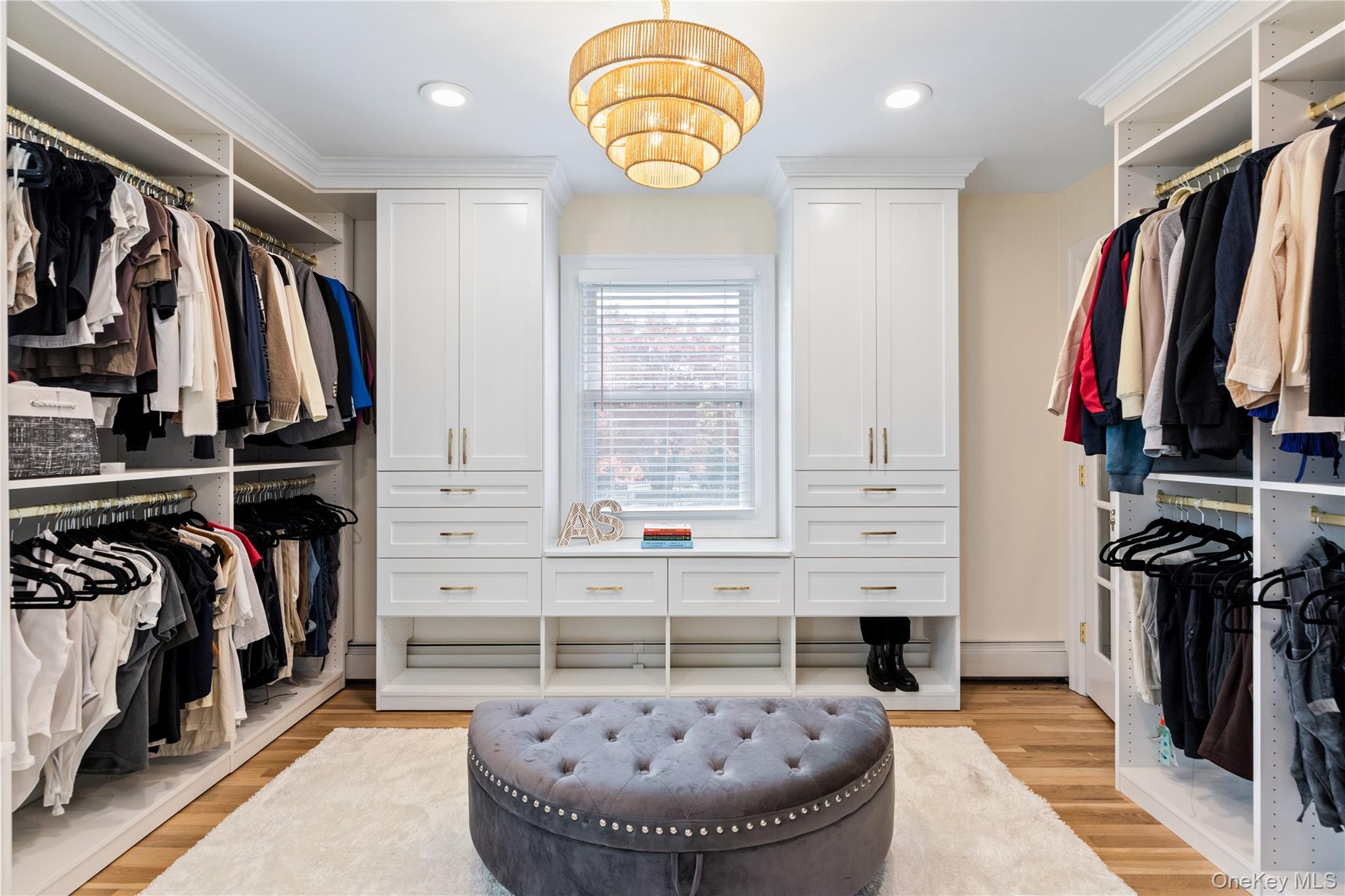 4 Long Ridge Road Plainview, NY 11803 - Photo 14 of 27 a view of walk in closet with clothes and shoes